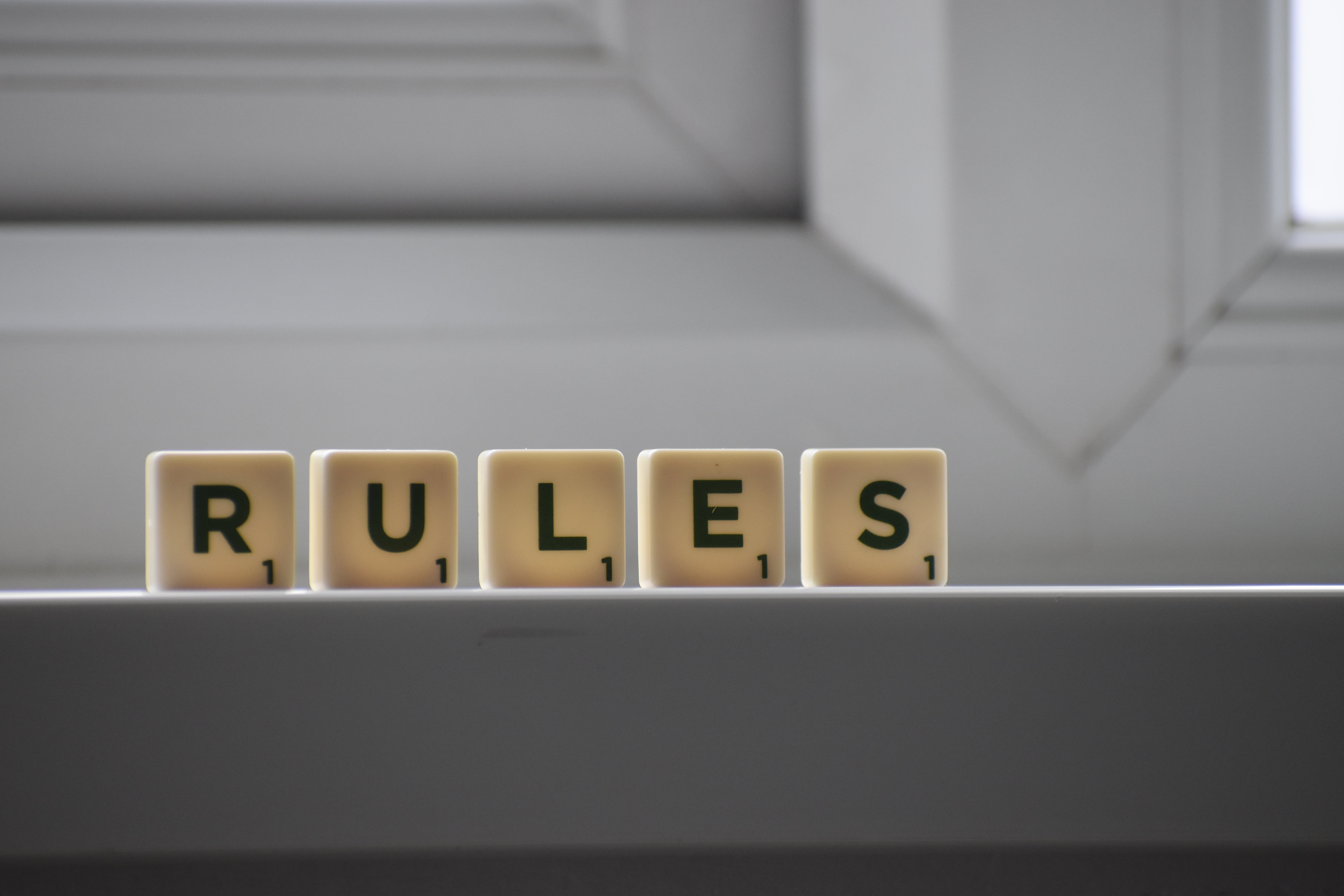 wooden blocks with the words "rules"